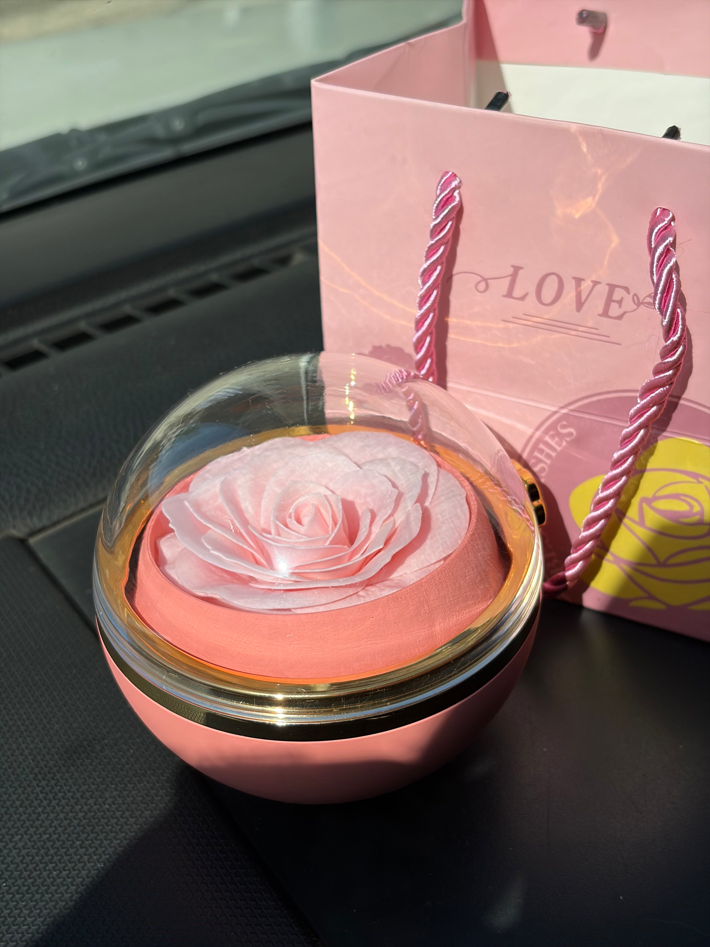 Rotating rose box