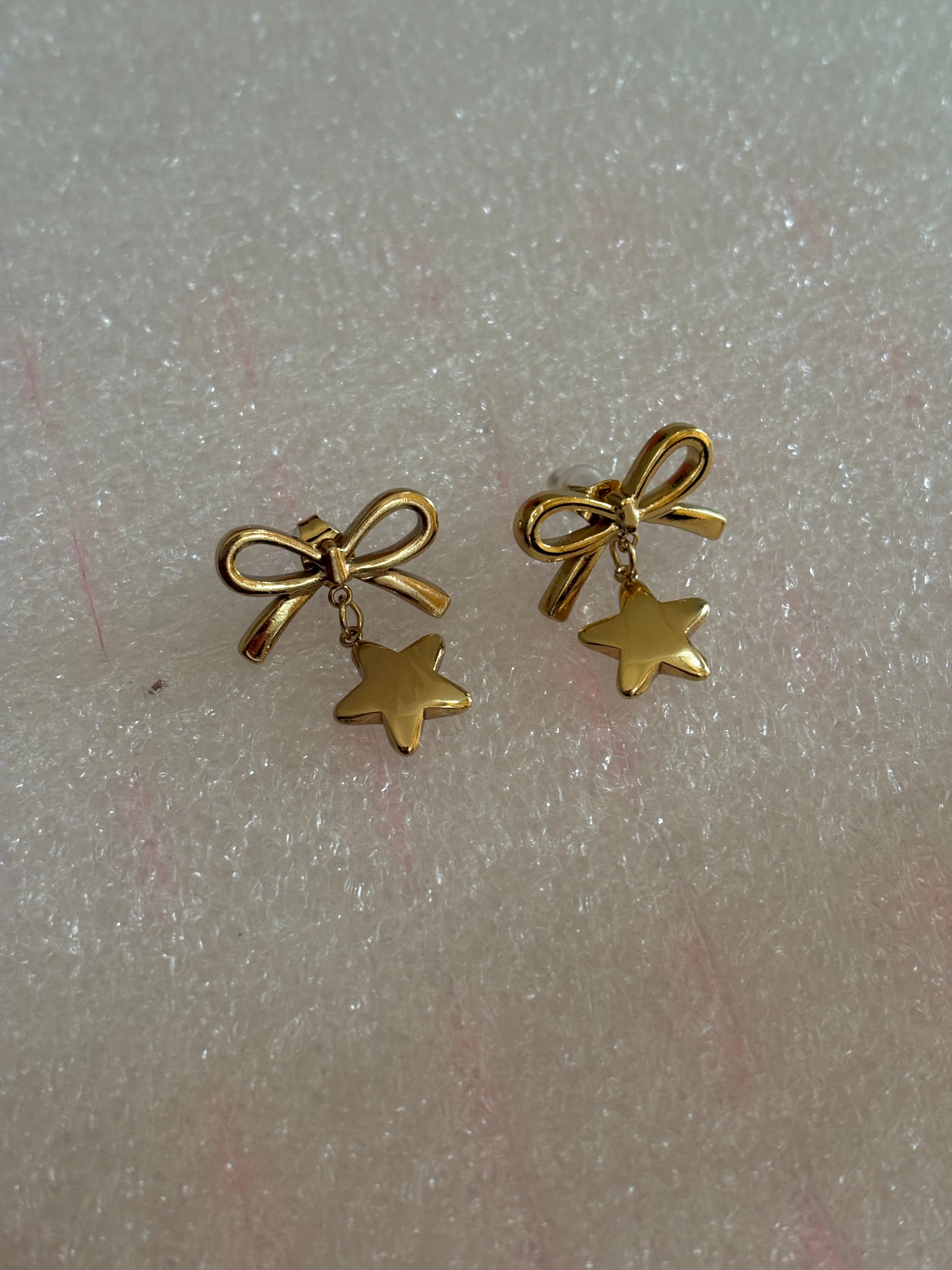 Star bow earring