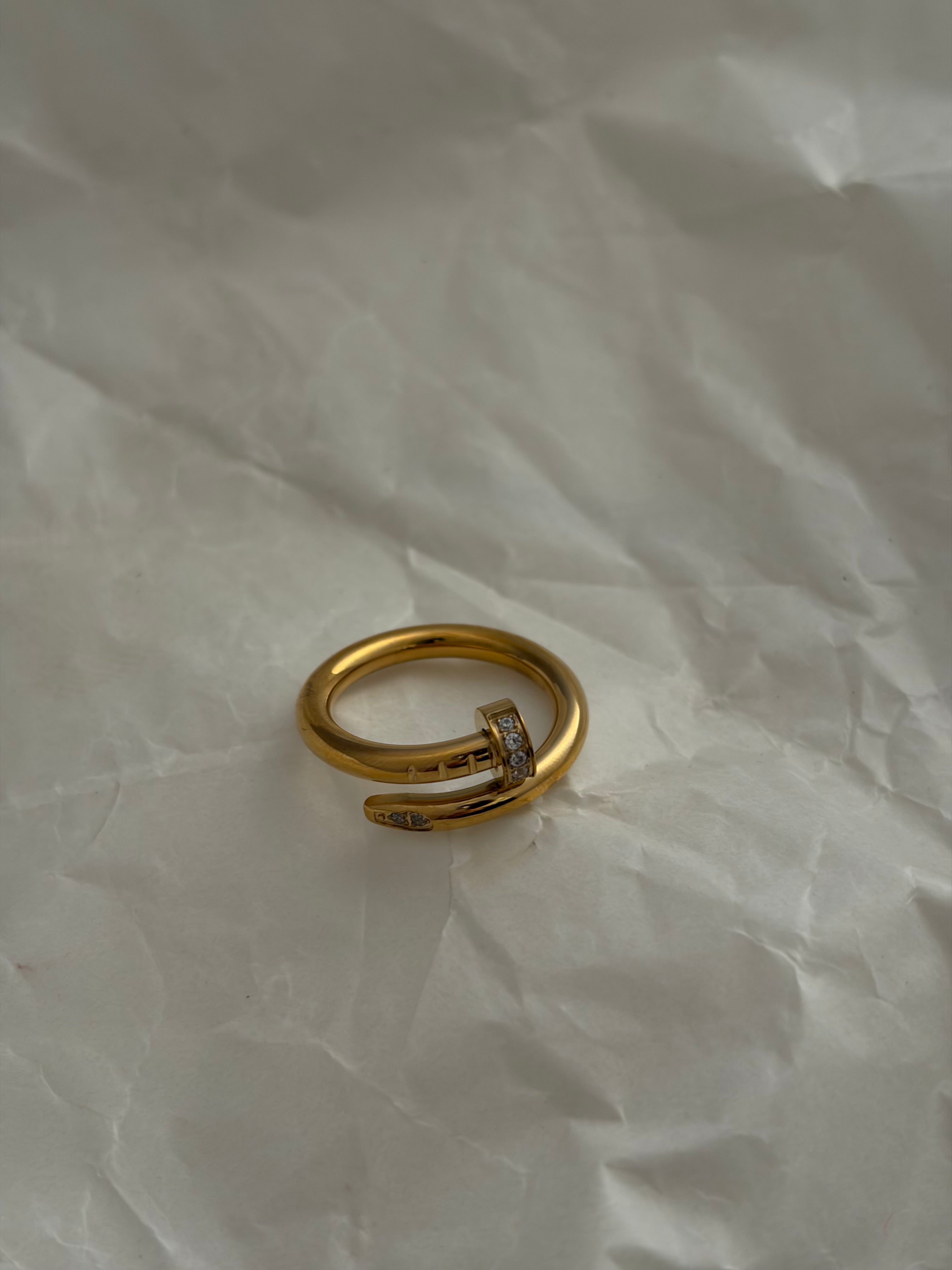 Nail studded ring