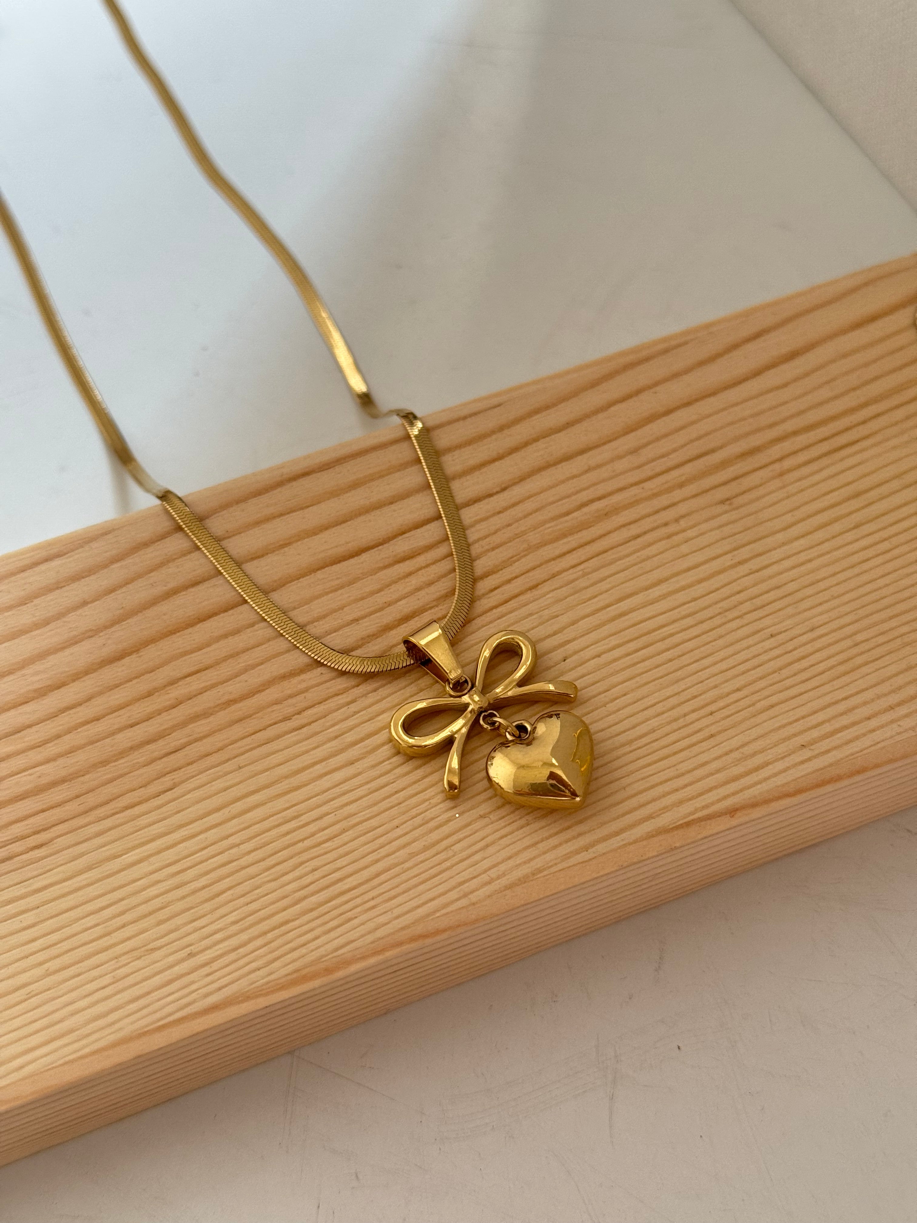 Bow heart necklace