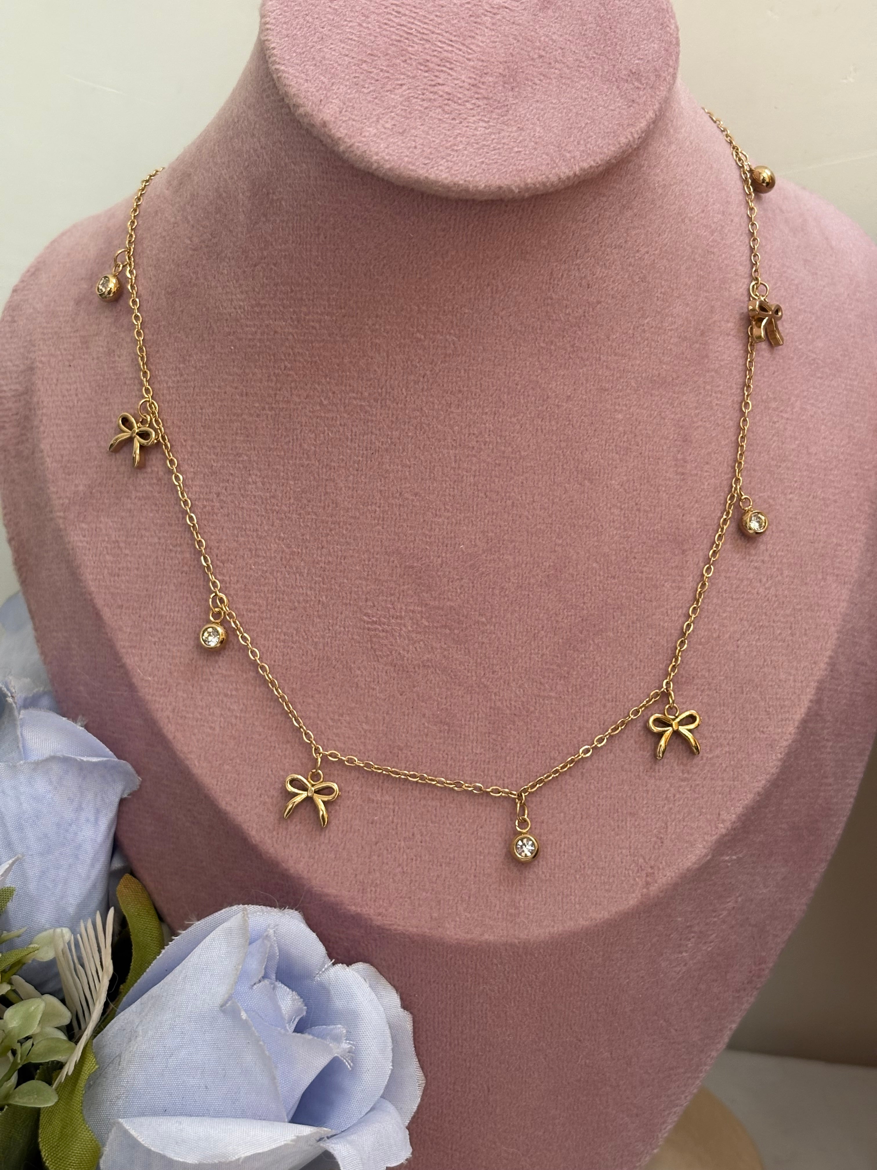 Bow charm necklace